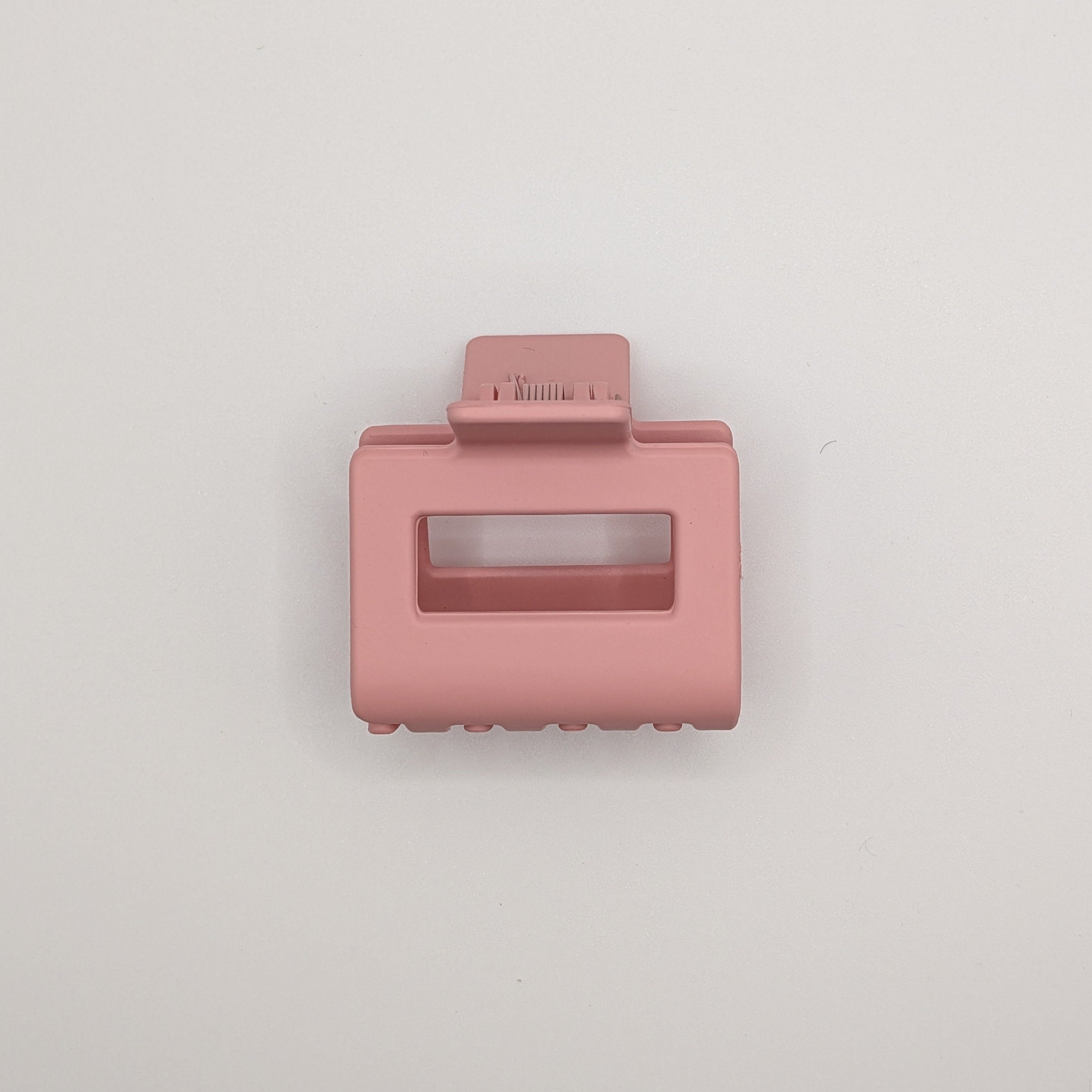 Rosa Marmor - Top-down view of Blush Pink 5cm matte rectangular hair claw clip.	

Draufsicht der zartrosa 5cm matten rechteckigen Haarklammer.